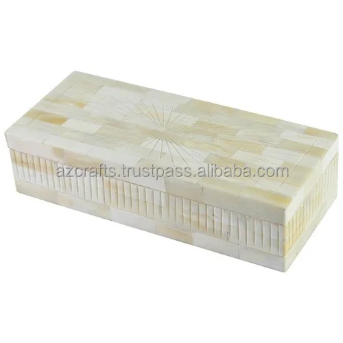 Box this box is made of MDF dyed bone pieces are handcrafted and pasted on it with white resin that gives a chevron pattern