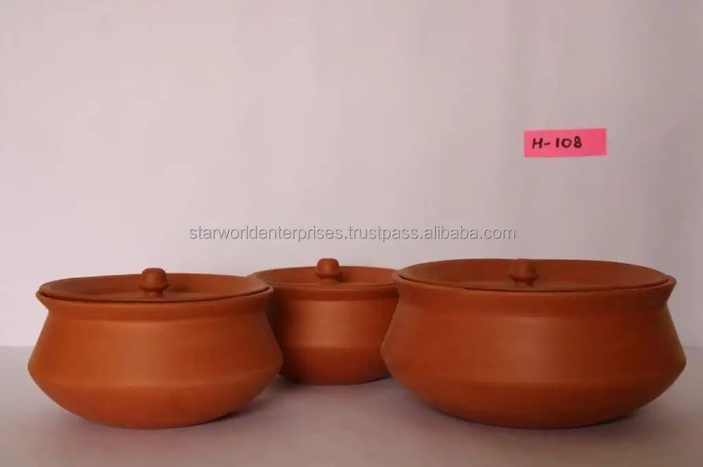 Clay kitchen pot Cooking vessel Earthenware Terra cotta Handcrafted Traditional cooking Clay pot cooking Kitchen utensil