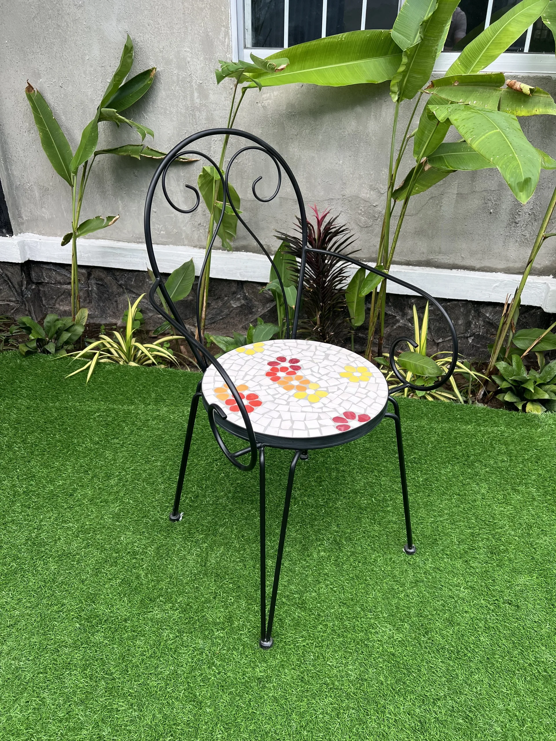 Iron chair with cement surface inlaid with unique decorative motifs, luxurious, resistant to high temperatures