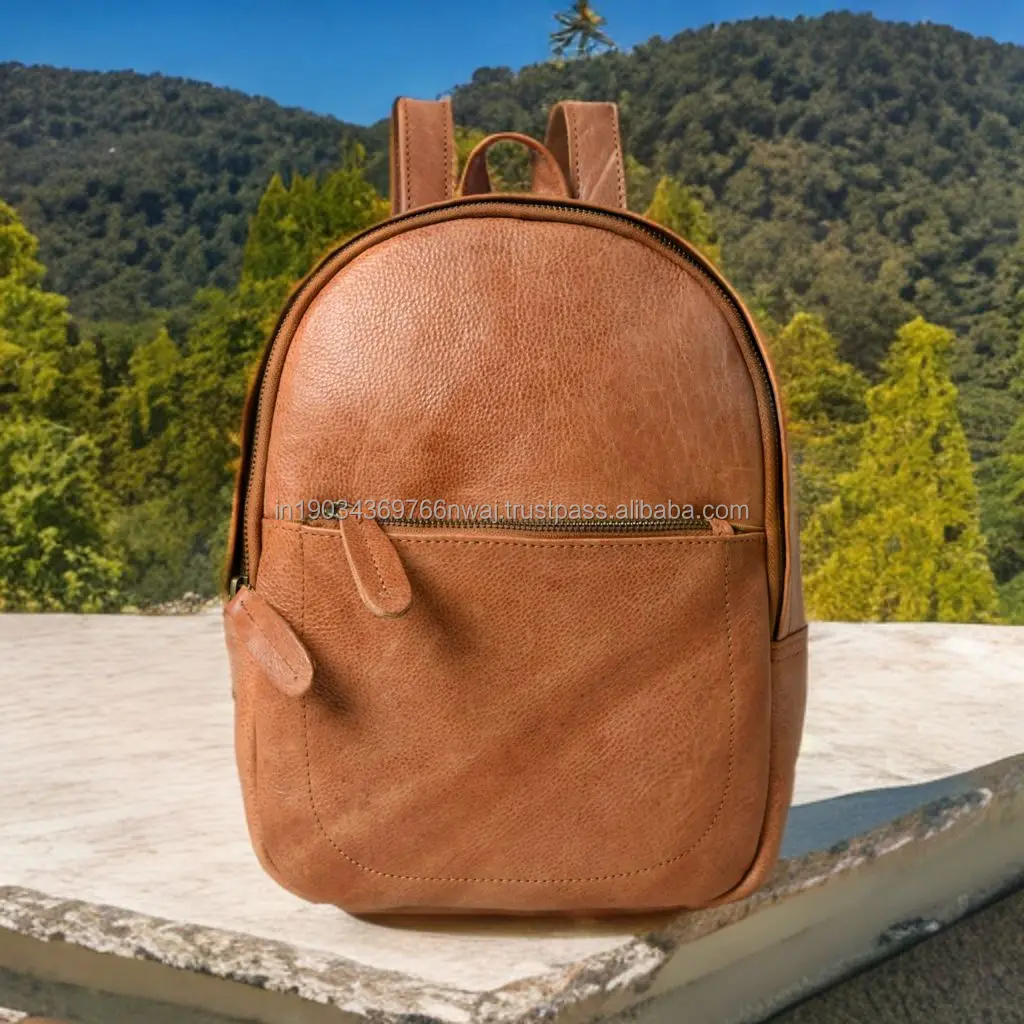 SMALL BAG OF COW LEATHER MOPPING WITH PURE COTTON LINING AND WITH DOUBLE ADJUSTABLE STRAP