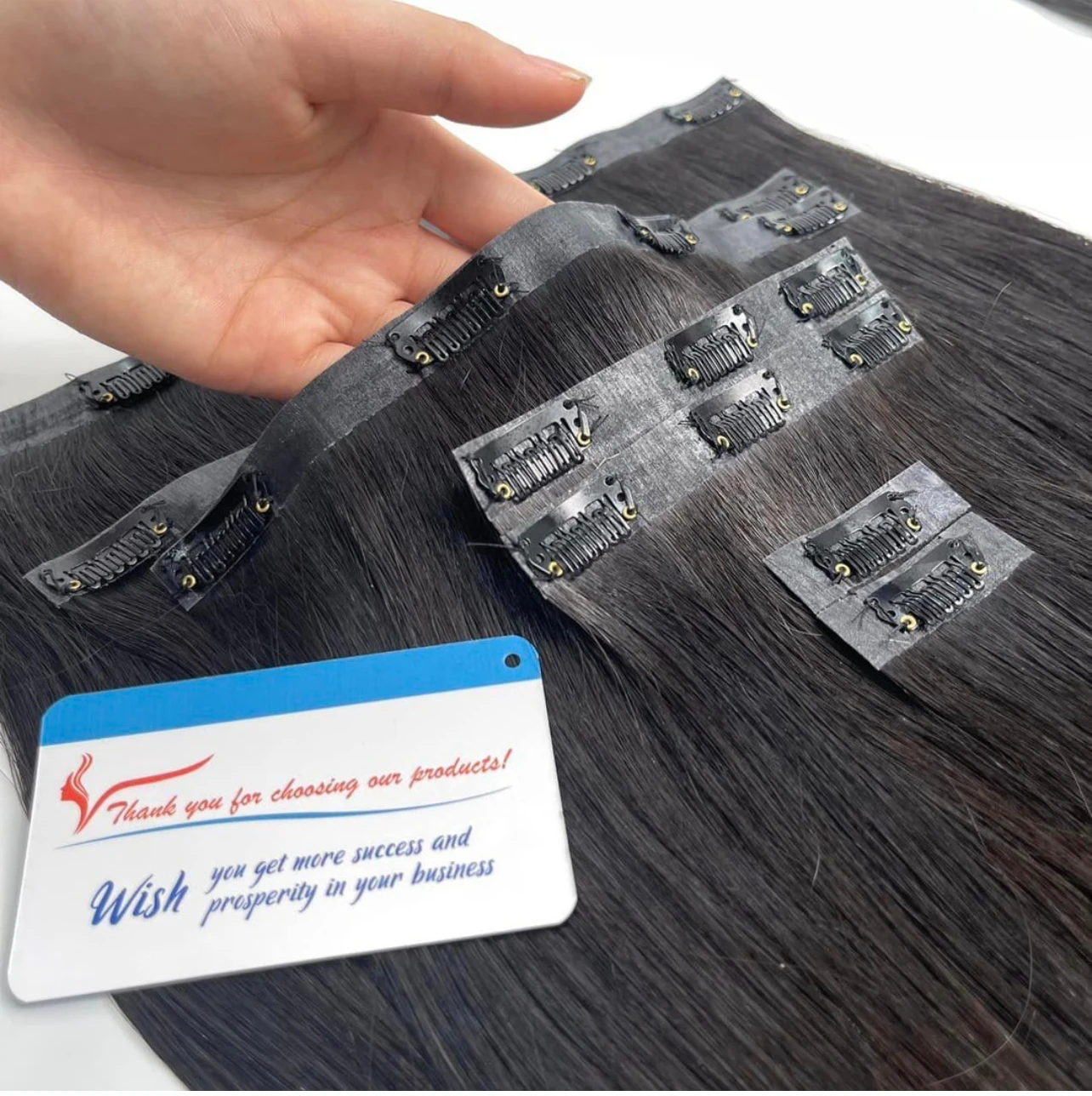 Factory price Natural black Clip-in 100% Vietnamese human Hair Extensions high quality silky no tangle no shedding large stock