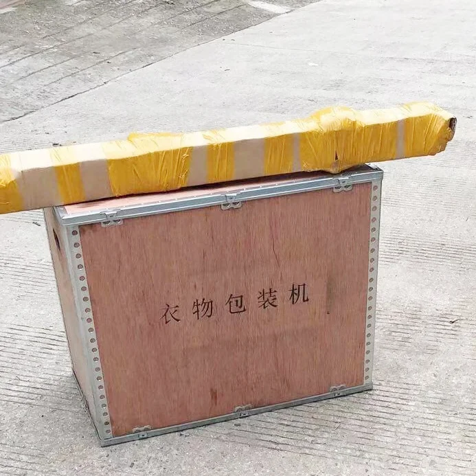 Factory wholesale automatic garment packing machine laundry packing machine for cloth