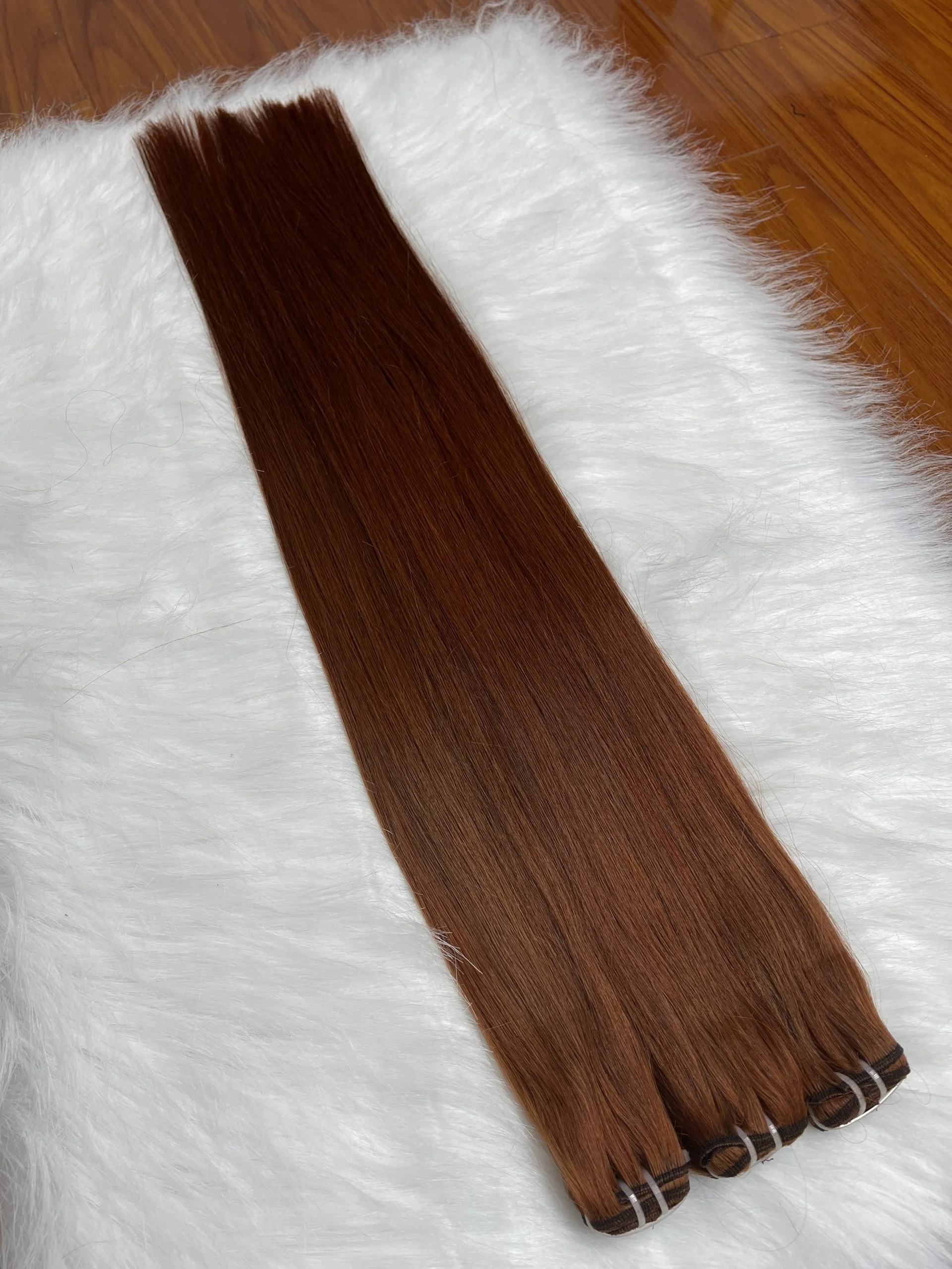 Высококачественные человеческие волосы для наращивания из Вьетнама оранжевого цвета