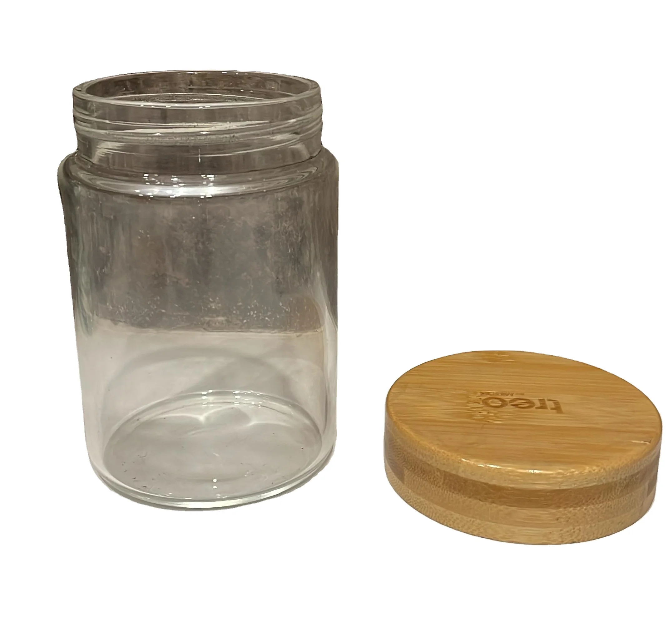 High Quality Factory direct high quality clear 100ml 150ml 200ml food use clear glass Jar for honey jam with Wooden cap