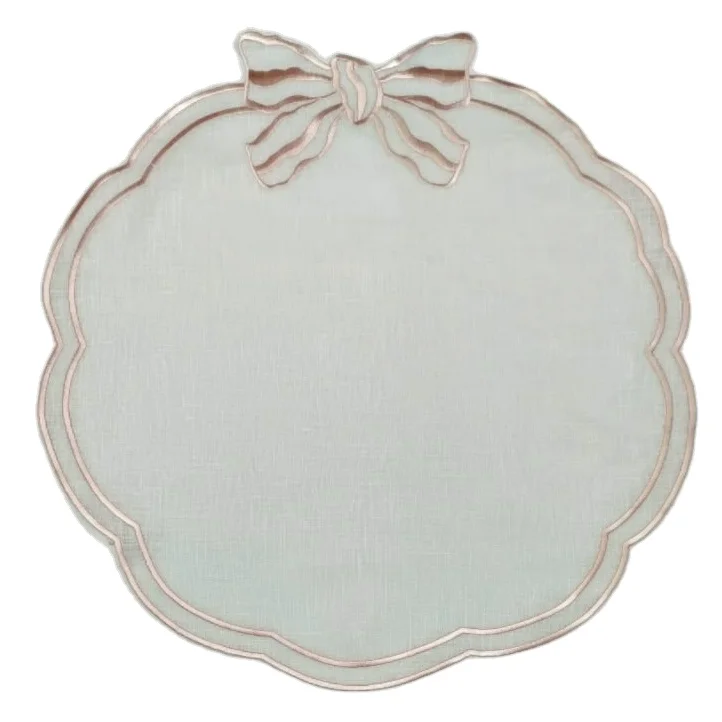 Round embroidered cutwork 100% linen placemat with scalloped edge and pink ribbon design