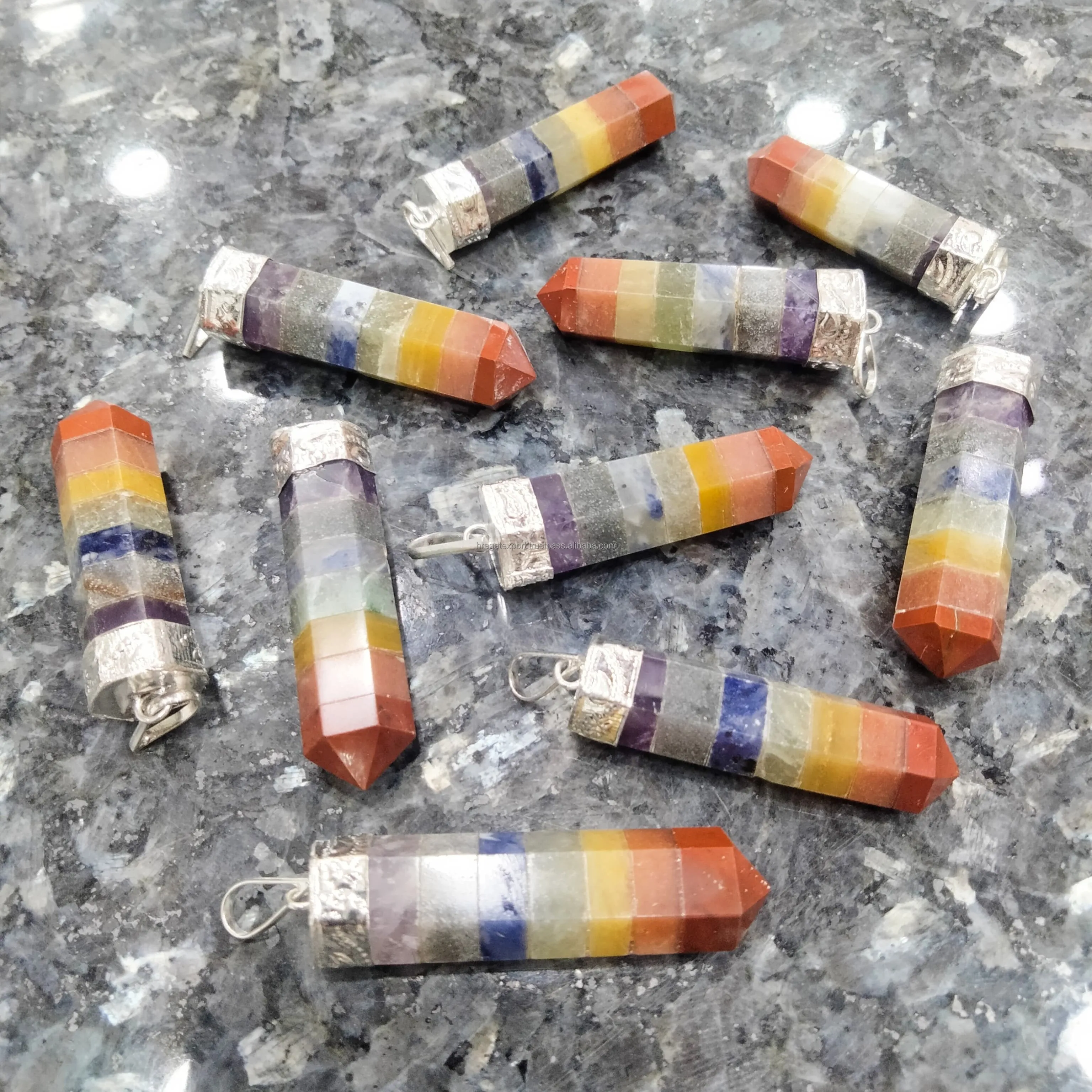 best selling natural crystals healing stone seven chakra bonded healing chakra pencil point crystal pendant necklace for sale