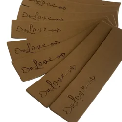 Factory Price High Quality Customized PU Brown Clothes Tag Embossed PU Label for Clothing