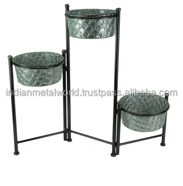 Black powder coated iron planter suppliers and exporters of modern metal planters and flower buckets at low price