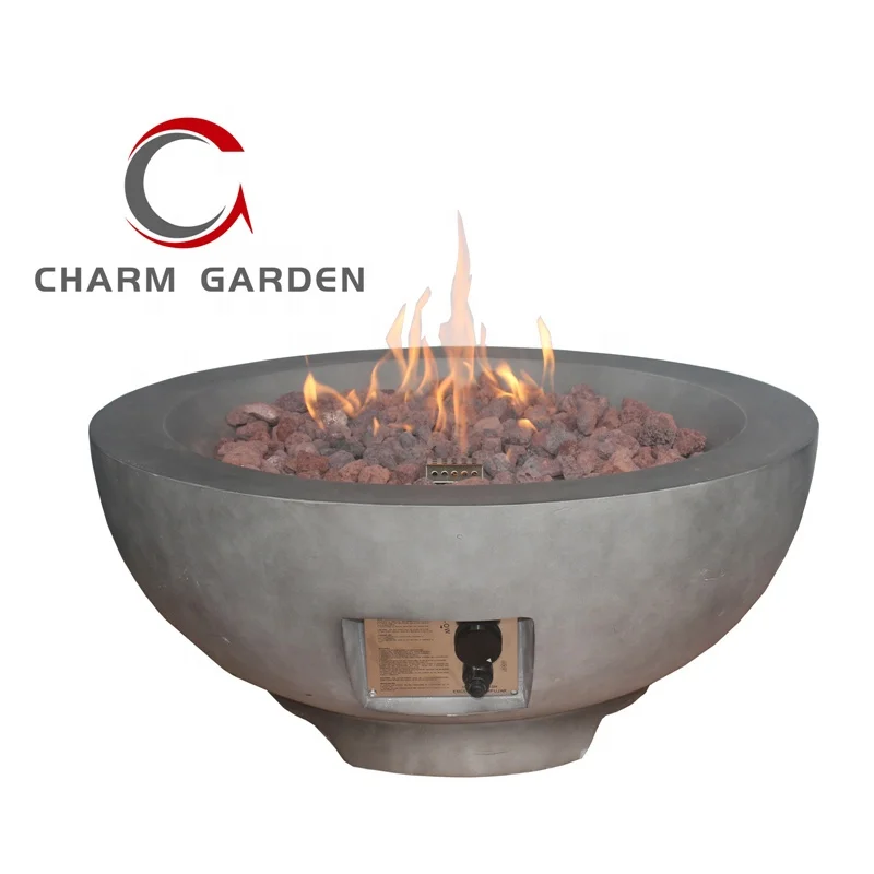 Concrete gas fire pit bowl using as coffee table with wood vein texture for outdoor living