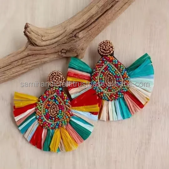 Whimsical bead earrings Ethnic bead embroidery Sophisticated earring design Bohemian beadwork Seed bead craftsmanship