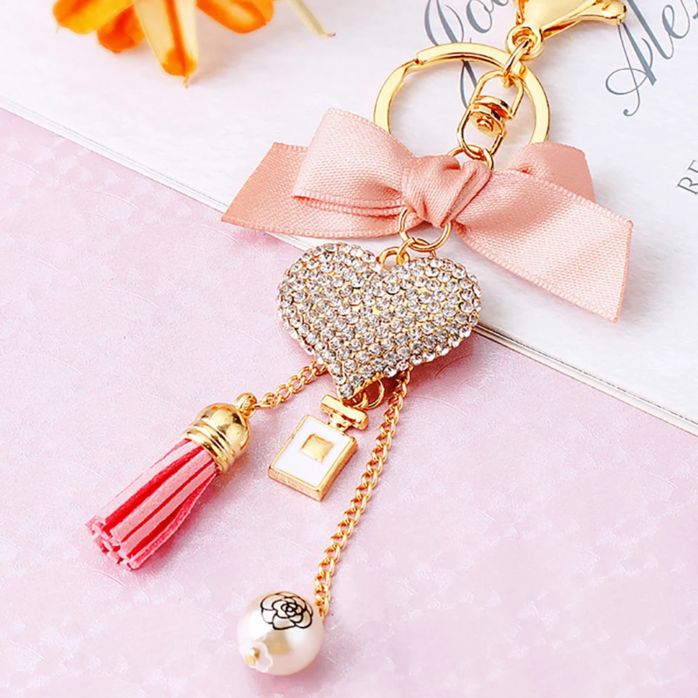Fashionable Ladies Crystal Keychain with Heart-Shaped Bow Perfume Bottle & Tassel Alloy Rhinestone Love Bag Keychain for Girls