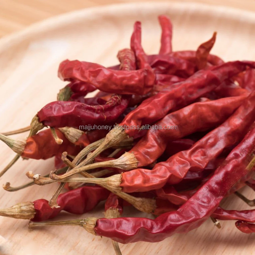 Хорошее качество Teja Red chilli со стеблем острый пряный в полипропиленовом мешке с ароматом и традиционным методом сушки из Индии