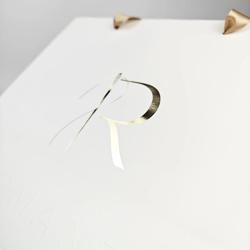 White shopping packaging clothes bag custom logo coated paper with ribbon handle luxury gift paper bags