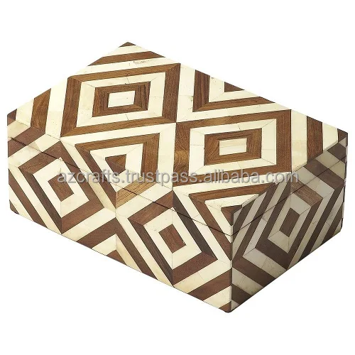 Box this box is made of MDF dyed bone pieces are handcrafted and pasted on it with white resin that gives a chevron pattern