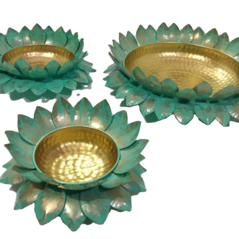 
Lotus platter in gold colour with brilliant design of lotus leaves and multiple shades of colour Diwali item new desinge 
