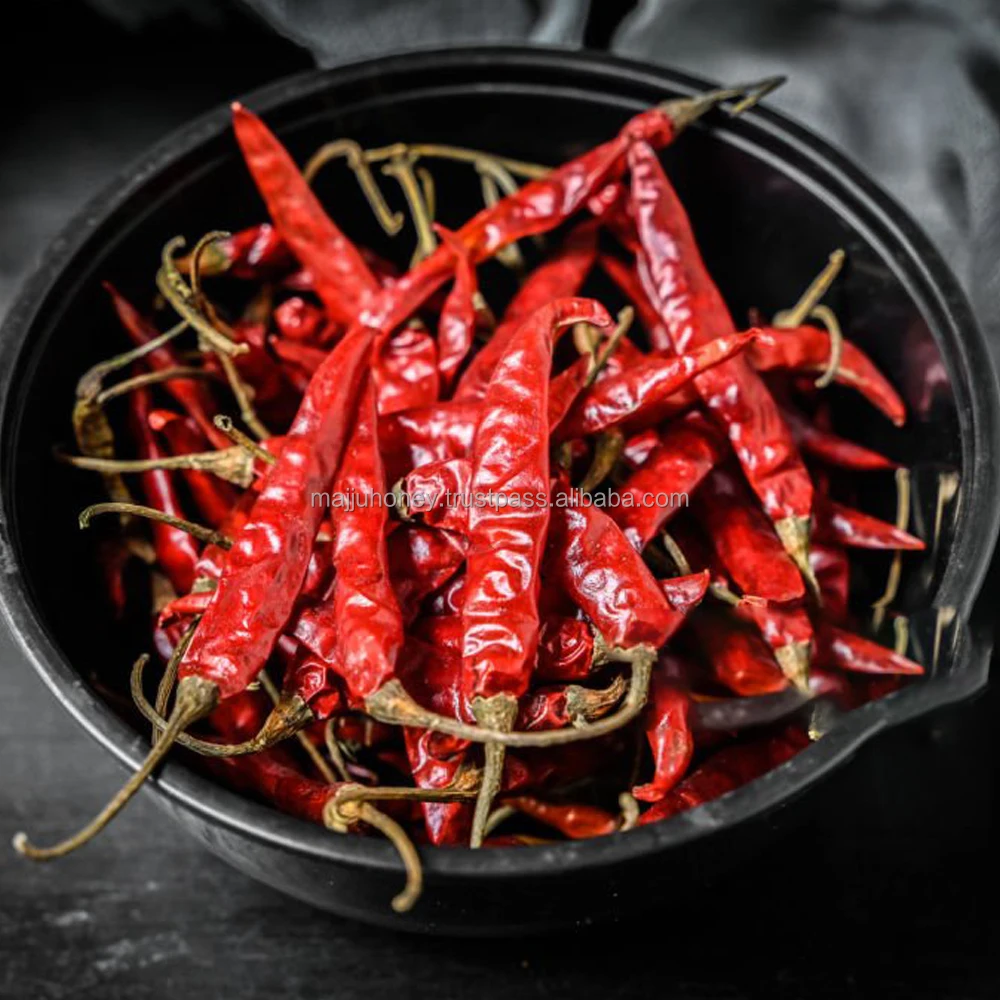 Хорошее качество Teja Red chilli со стеблем острый пряный в полипропиленовом мешке с ароматом и традиционным методом сушки из Индии