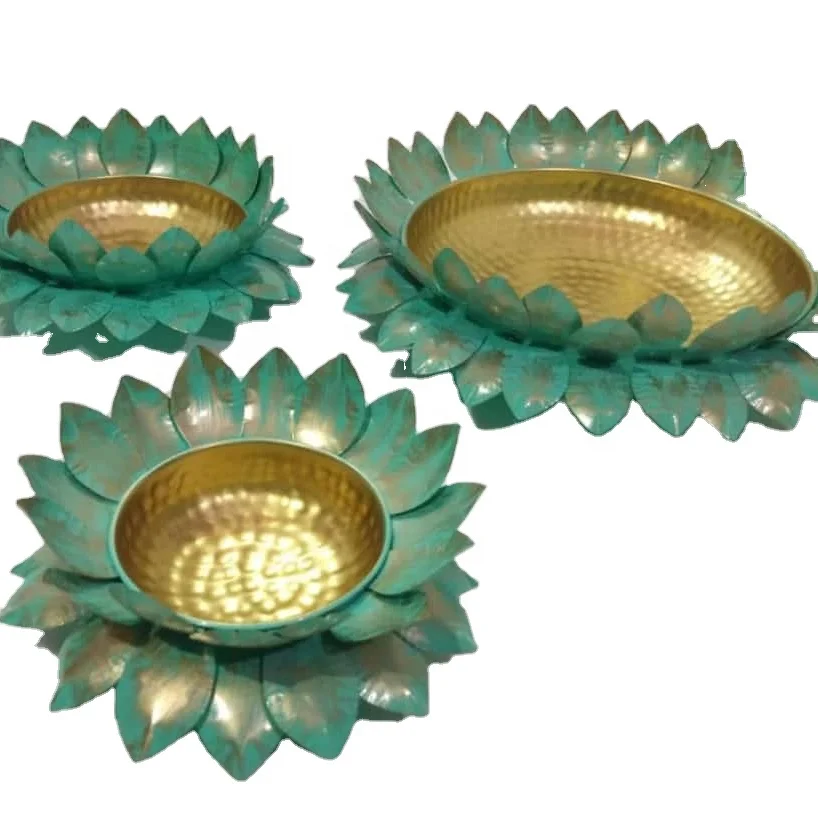 
Lotus platter in gold colour with brilliant design of lotus leaves and multiple shades of colour Diwali item new desinge 