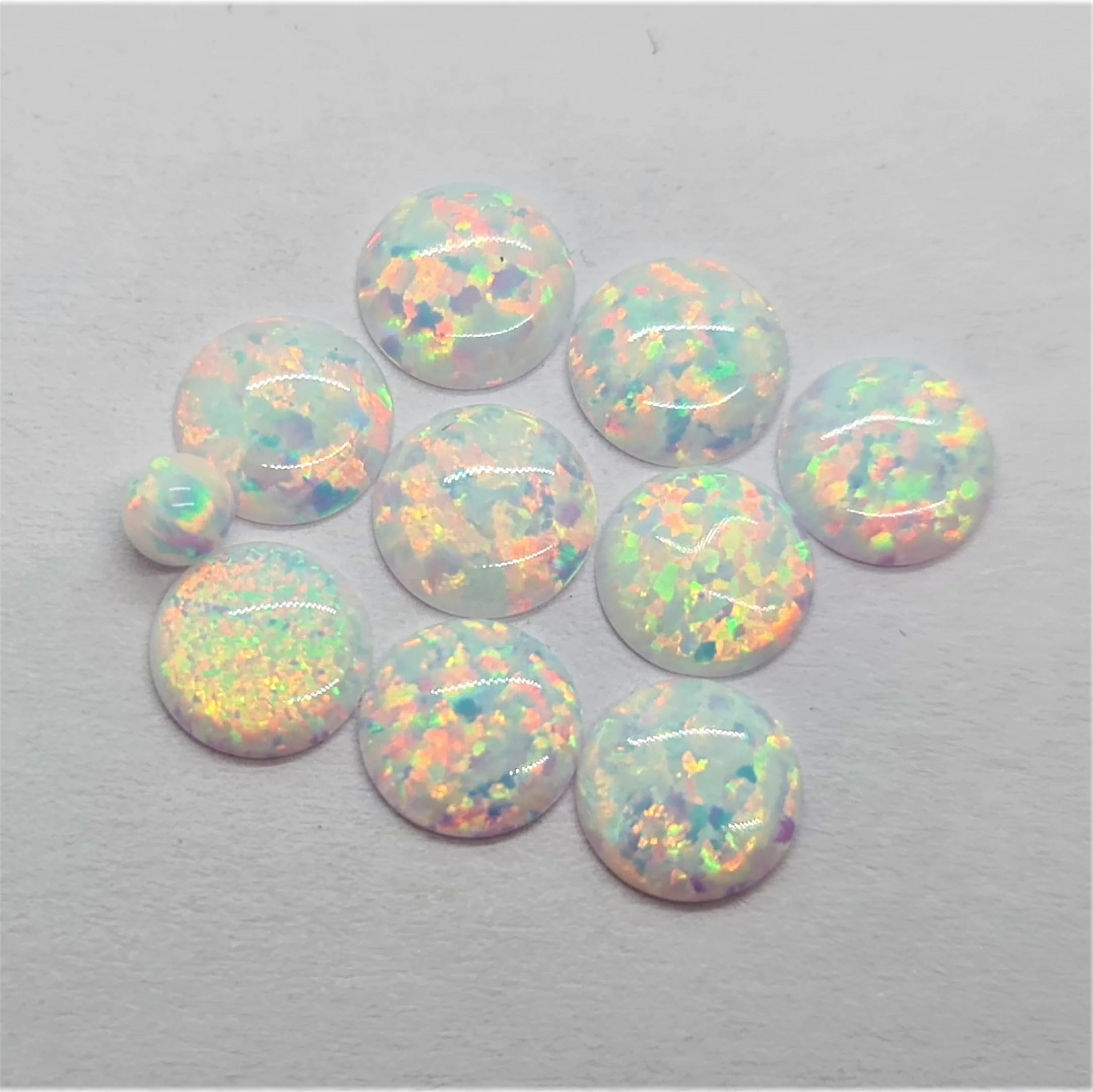 Loose Gemstone Synthetic Opal Ball Shaped Beads cut in all sizes till 15mm in other shapes and sizes as well