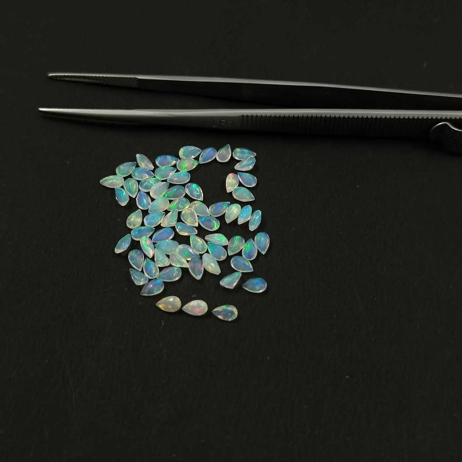 Awesome Multi Color Play 3x5mm Ethiopian Opal Faceted Pear Cut AAA Quality Wholesale Genuine Gemstones Jewelry Making Supplier