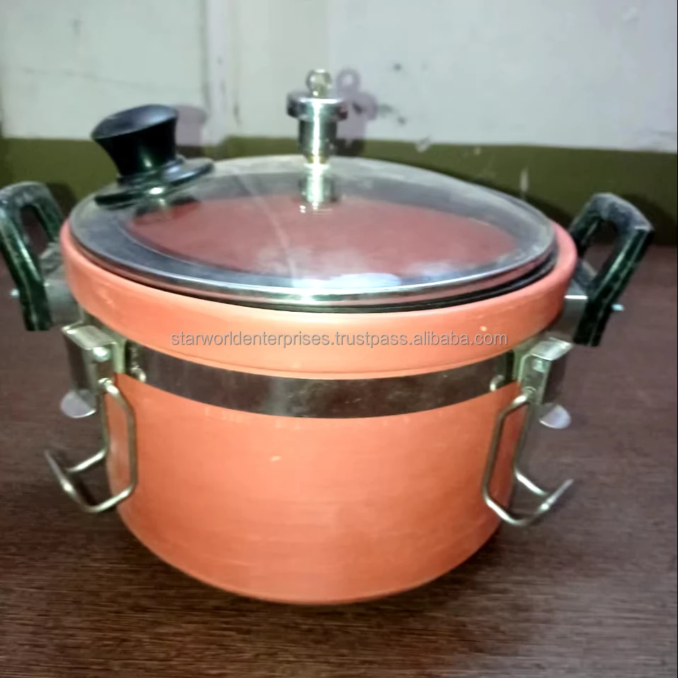 Clay kitchen pot Cooking vessel Earthenware Terra cotta Handcrafted Traditional cooking Clay pot cooking Kitchen utensil