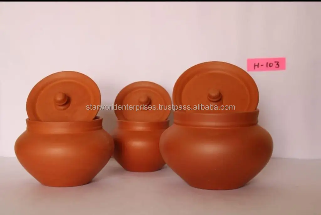 Clay kitchen pot Cooking vessel Earthenware Terra cotta Handcrafted Traditional cooking Clay pot cooking Kitchen utensil