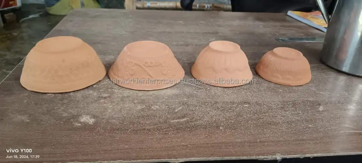 Clay kitchen pot Cooking vessel Earthenware Terra cotta Handcrafted Traditional cooking Clay pot cooking Kitchen utensil