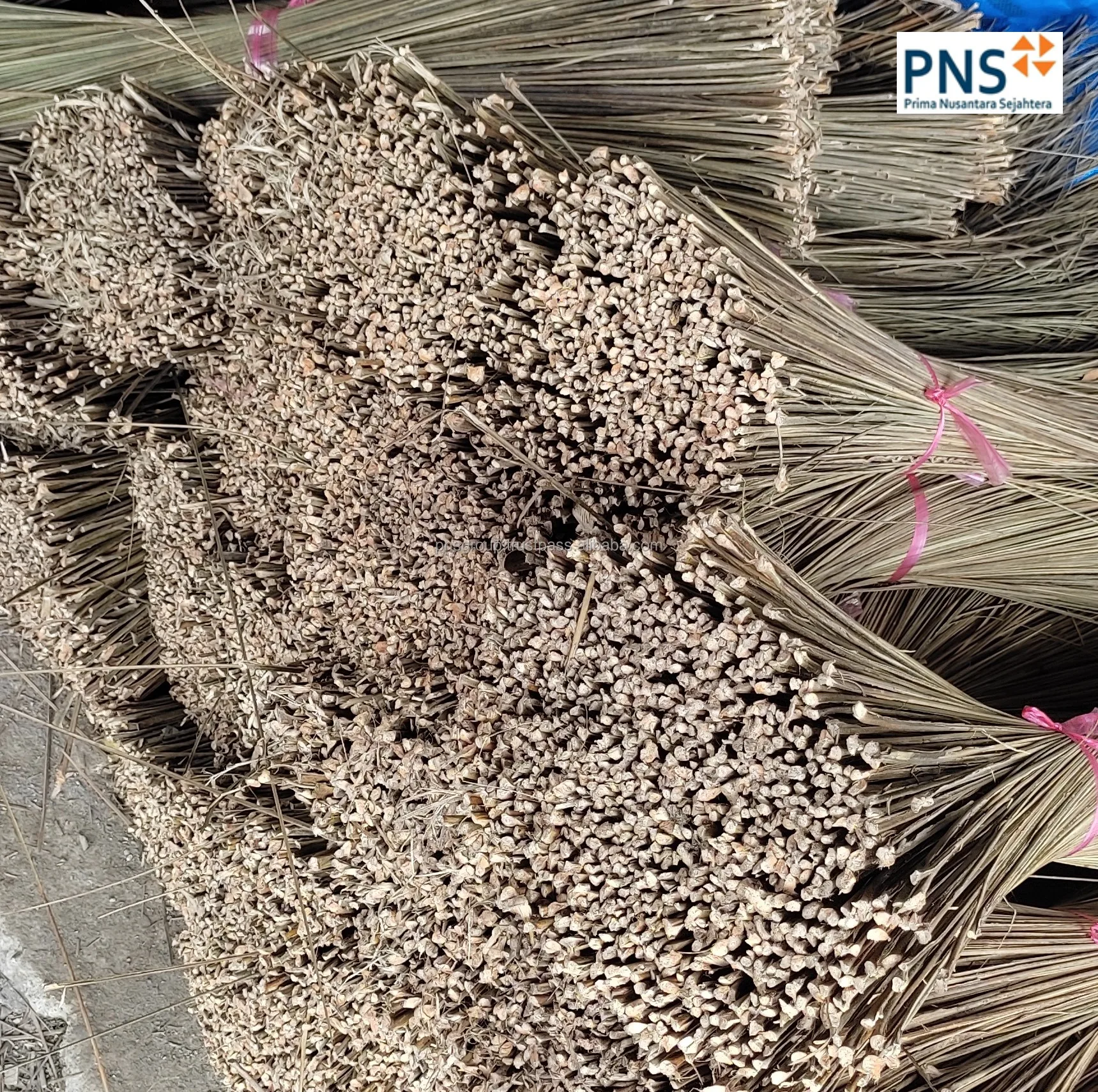 ecofriendly palm leaf broom stick long handle sweeper for gardens patios and outdoor spaces origin North Sumatra Indonesia