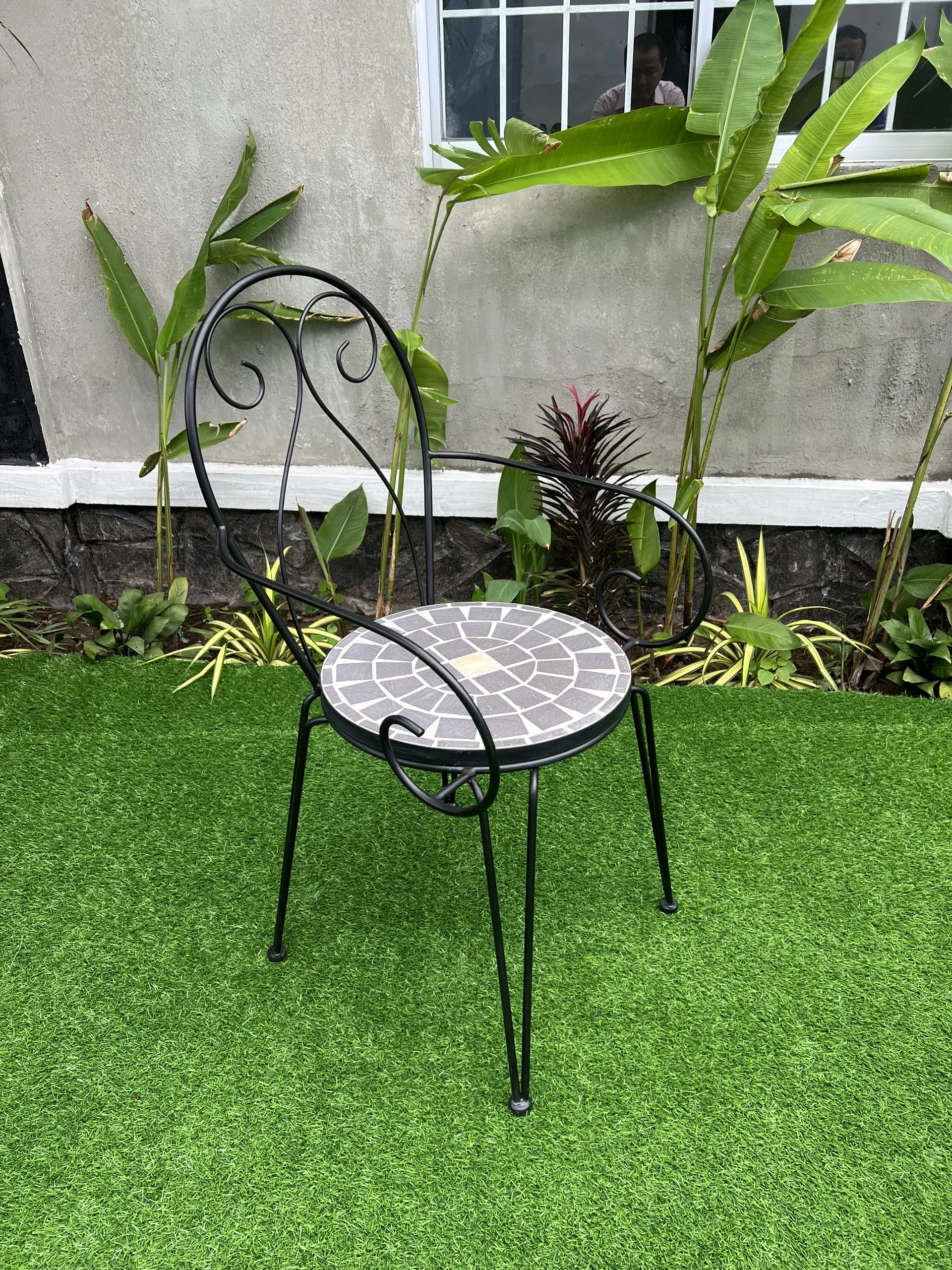 Iron chair with cement surface inlaid with unique decorative motifs, luxurious, resistant to high temperatures