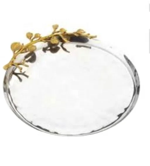 Decorative metal plate in stainless steel in silver color with golden handles .