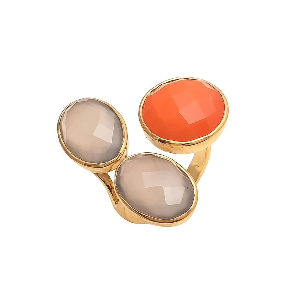 gold plated ring features three stunning stones in different colors, creating a mesmerizing display of elegance and style