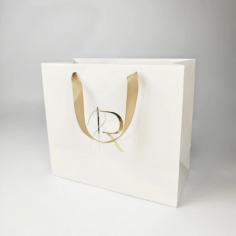 White shopping packaging clothes bag custom logo coated paper with ribbon handle luxury gift paper bags