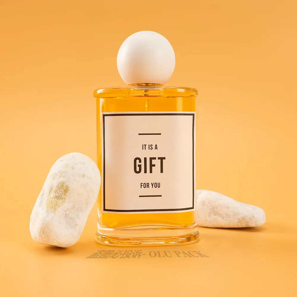 Factory Supply Low MOQ Clear Refillable Brand Perfume Package 100ml French Parfum Glass Scent Bottle with Custom Label