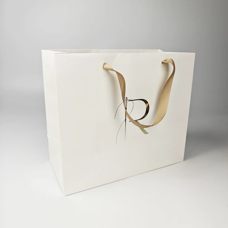 White shopping packaging clothes bag custom logo coated paper with ribbon handle luxury gift paper bags
