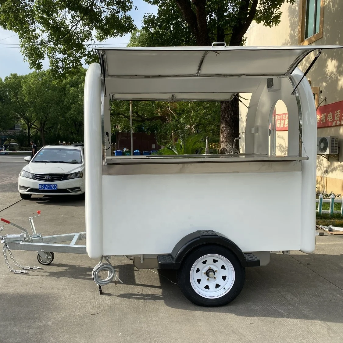 Custom Designed Mobile Food Trailer on the Road with Optional Accessories