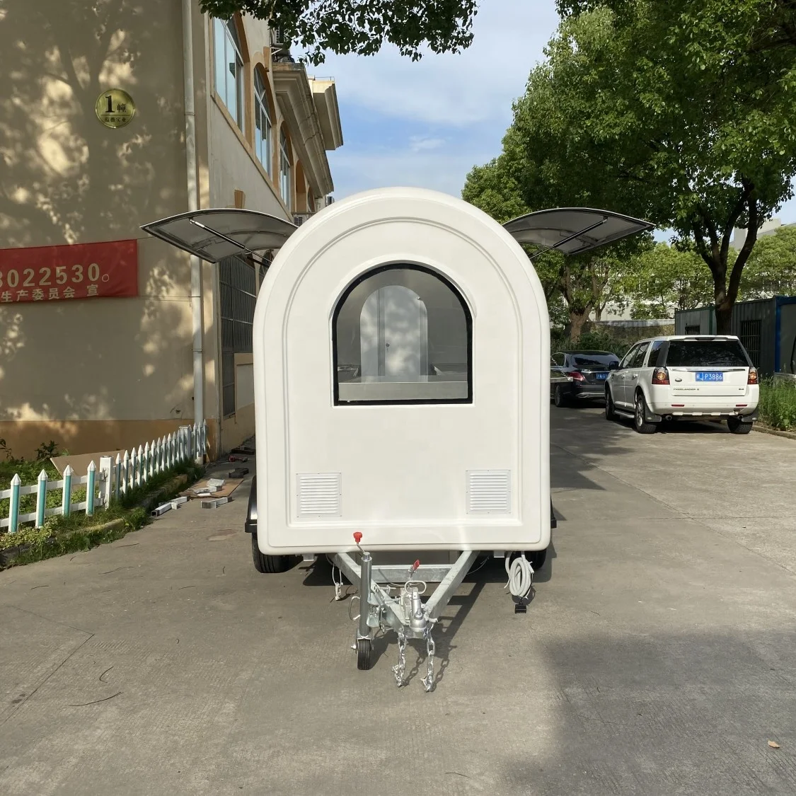 Custom Designed Mobile Food Trailer on the Road with Optional Accessories