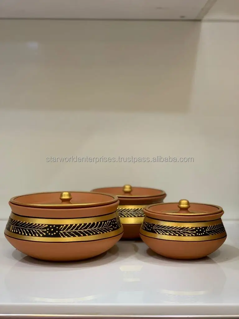 Clay kitchen pot Cooking vessel Earthenware Terra cotta Handcrafted Traditional cooking Clay pot cooking Kitchen utensil
