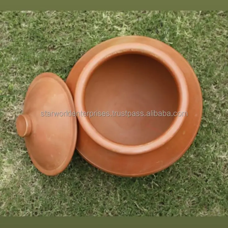 Clay kitchen pot Cooking vessel Earthenware Terra cotta Handcrafted Traditional cooking Clay pot cooking Kitchen utensil