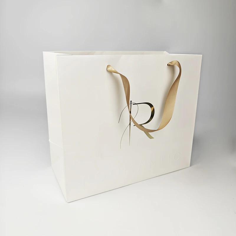 White shopping packaging clothes bag custom logo coated paper with ribbon handle luxury gift paper bags
