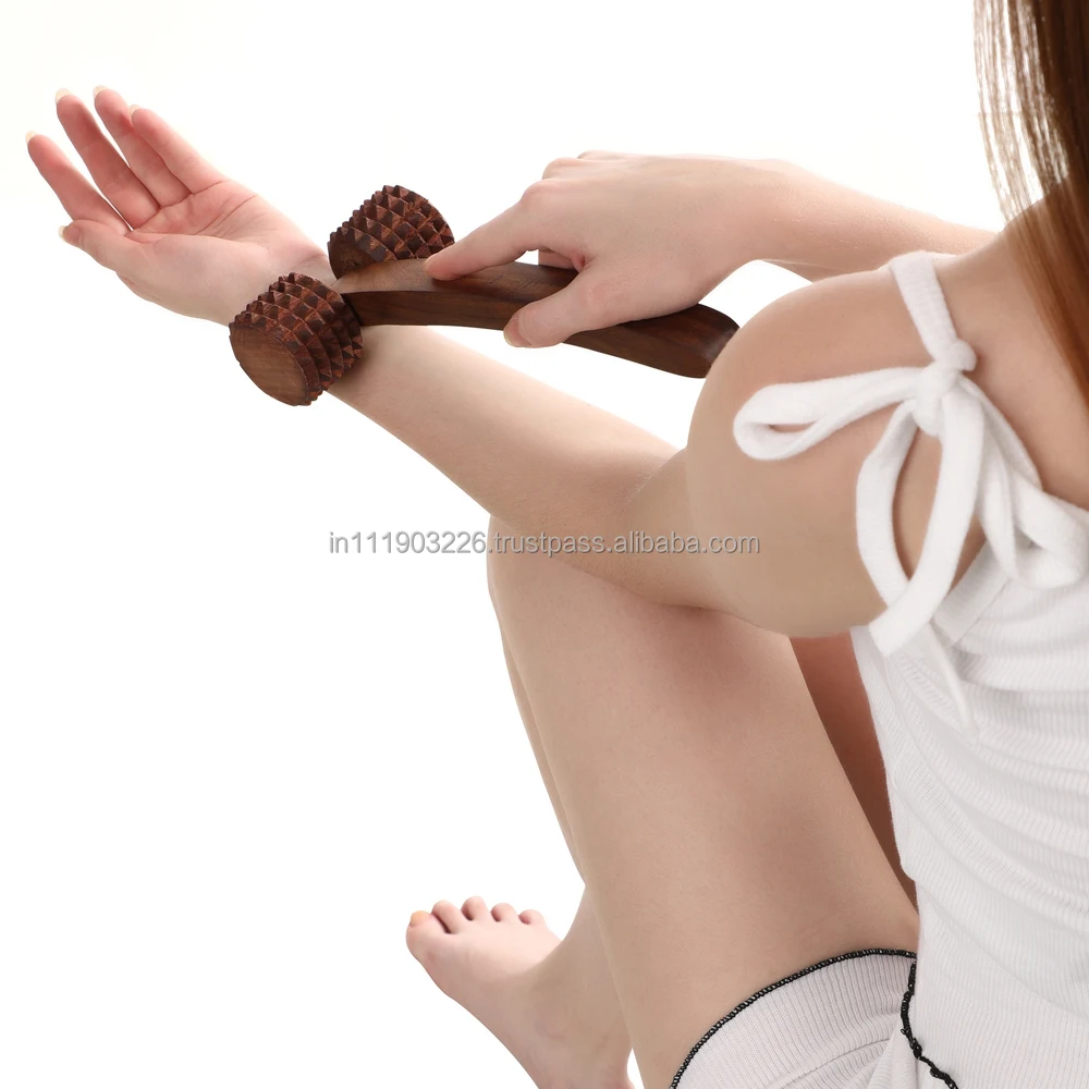 Manual wooden acupressure roller based on ancient acupuncture or acupressure therapy