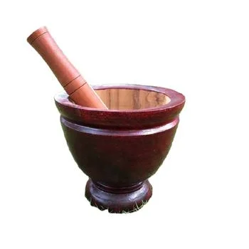 Rustic wooden mortar and pestle set that combines traditional craftsmanship with modern kitchen needs, perfect for any home cook