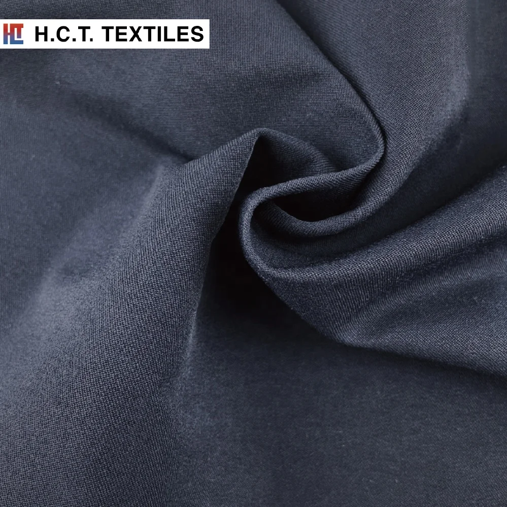 Water repellent taslan yarn spandex nylon twill stretch fabric