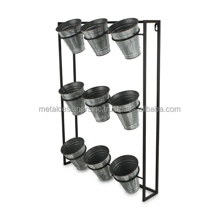 Metal 9 Galvanized planters with black metal stand holding planters for indoor and out door use