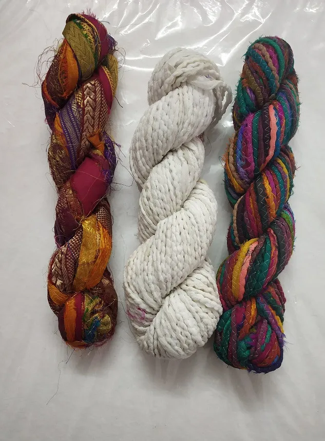 
multi coloured sari silk yarns made from recycled sari silk fibres available in 100 gram skeins suitable for knitters 