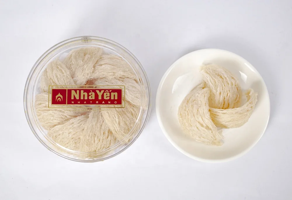 Изысканные крошки белое Птичье гнездо приносит большое здоровье всей семье.