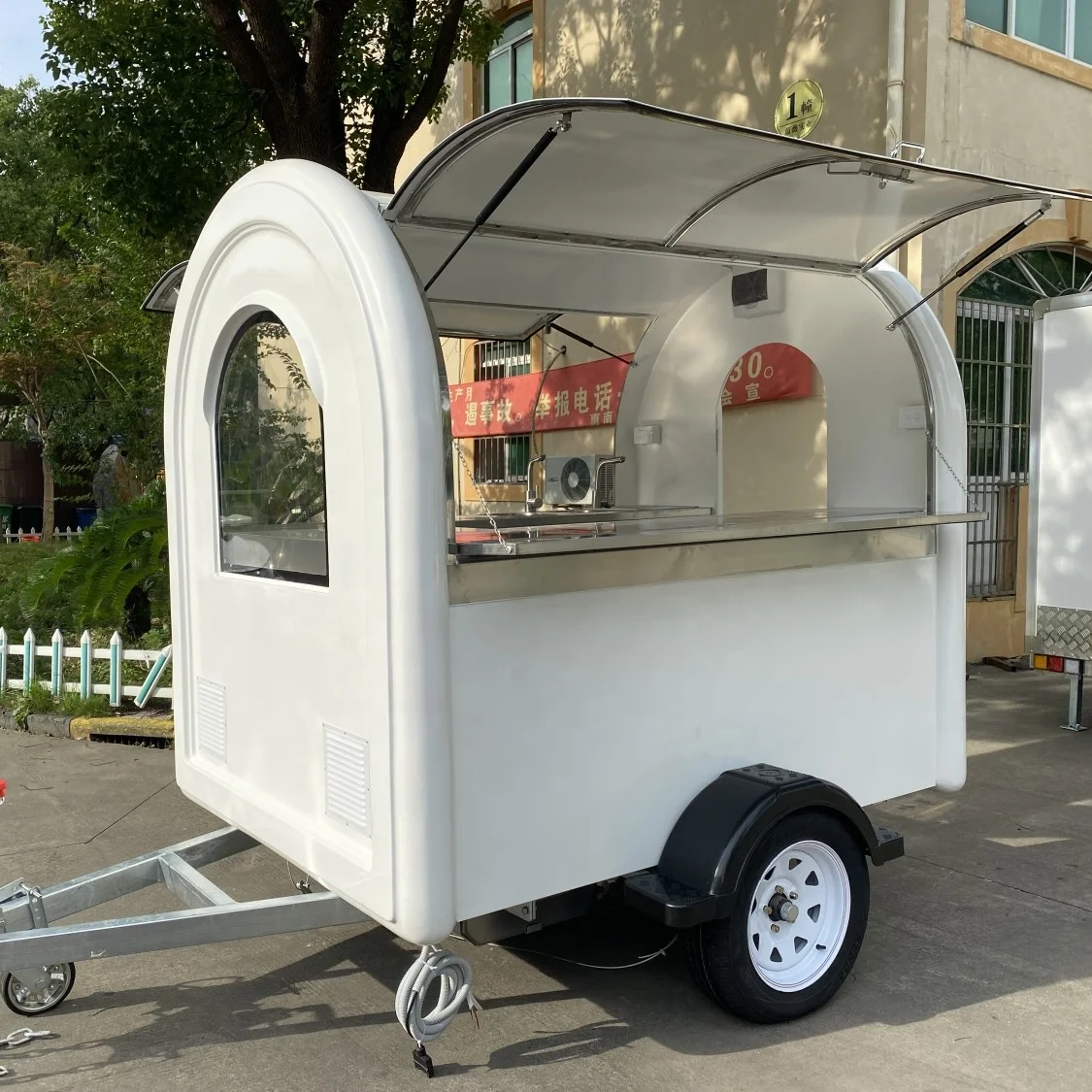 Custom Designed Mobile Food Trailer on the Road with Optional Accessories