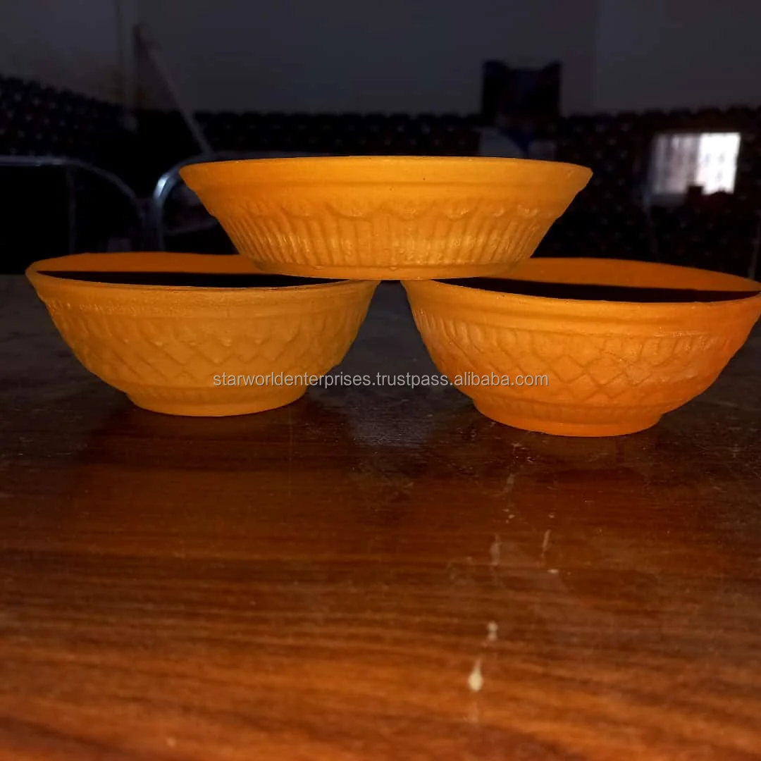 Clay kitchen pot Cooking vessel Earthenware Terra cotta Handcrafted Traditional cooking Clay pot cooking Kitchen utensil