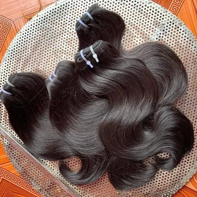 Factory wholesale price indian hair bundle,100% human hair extensions,raw hair vendors natural wave virgin indian hair