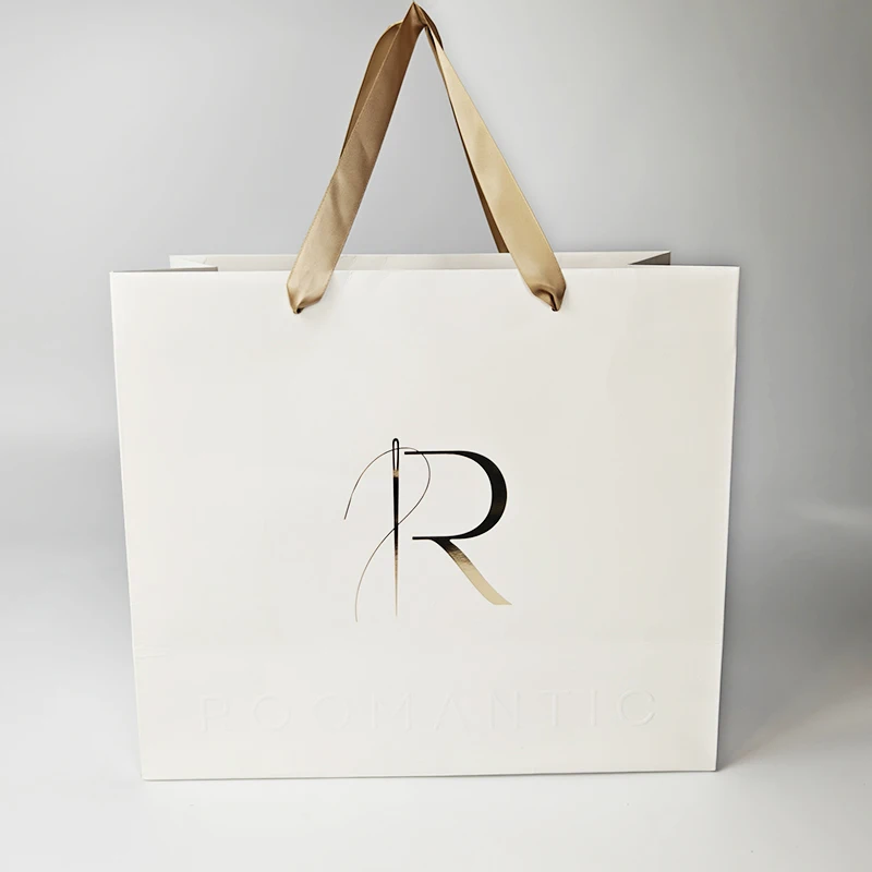 White shopping packaging clothes bag custom logo coated paper with ribbon handle luxury gift paper bags