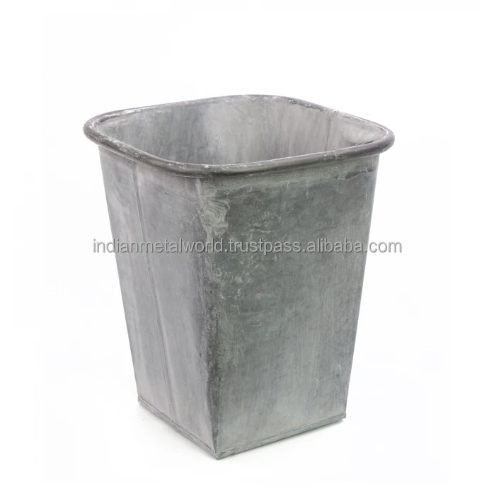Black powder coated iron planter suppliers and exporters of modern metal planters and flower buckets at low price