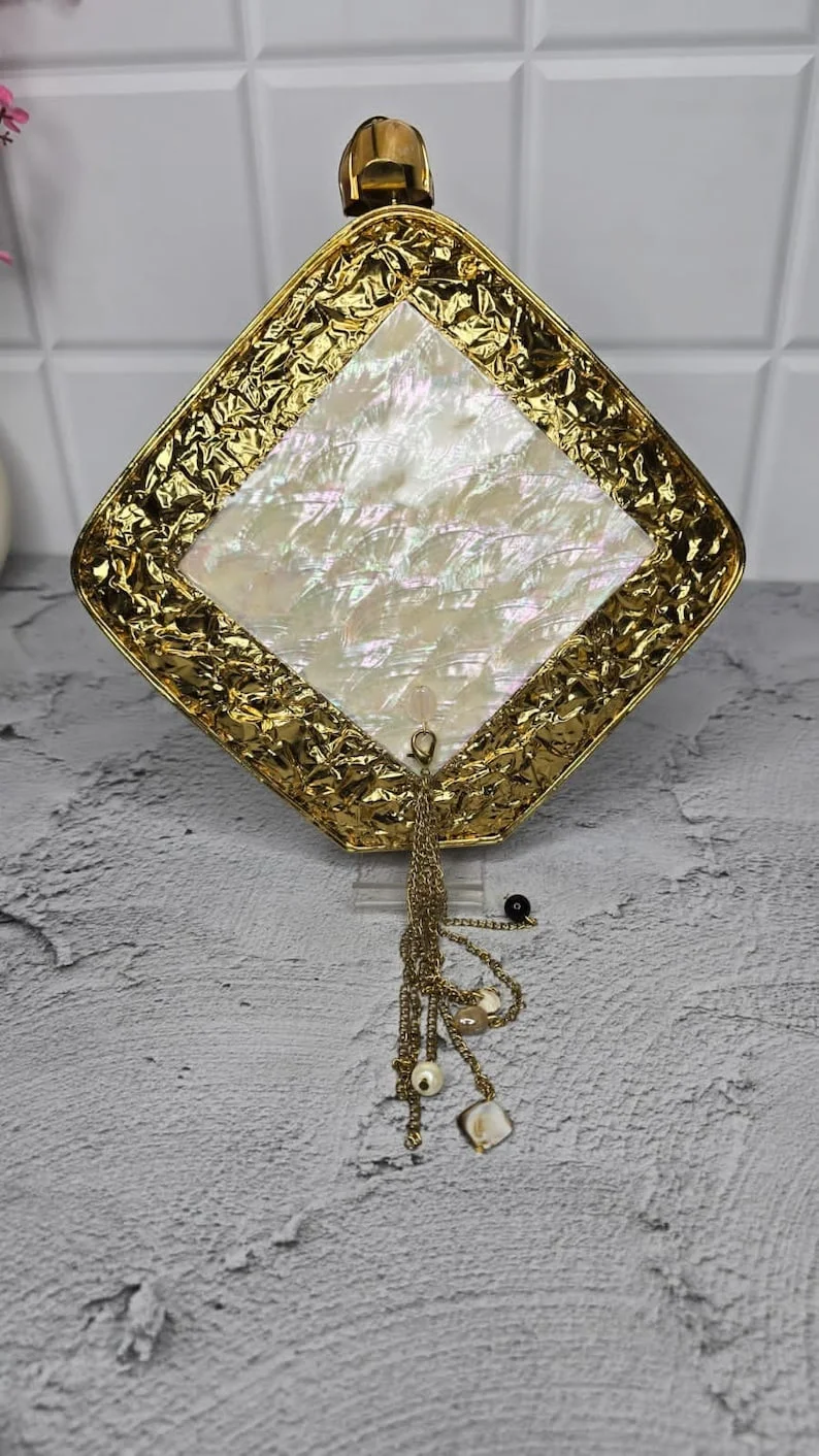 Exporter and Manufacturer of Round Luxurious Mother Of Pearl Handcrafted Clutch at Low Price for women by LUXURY CRAFTS